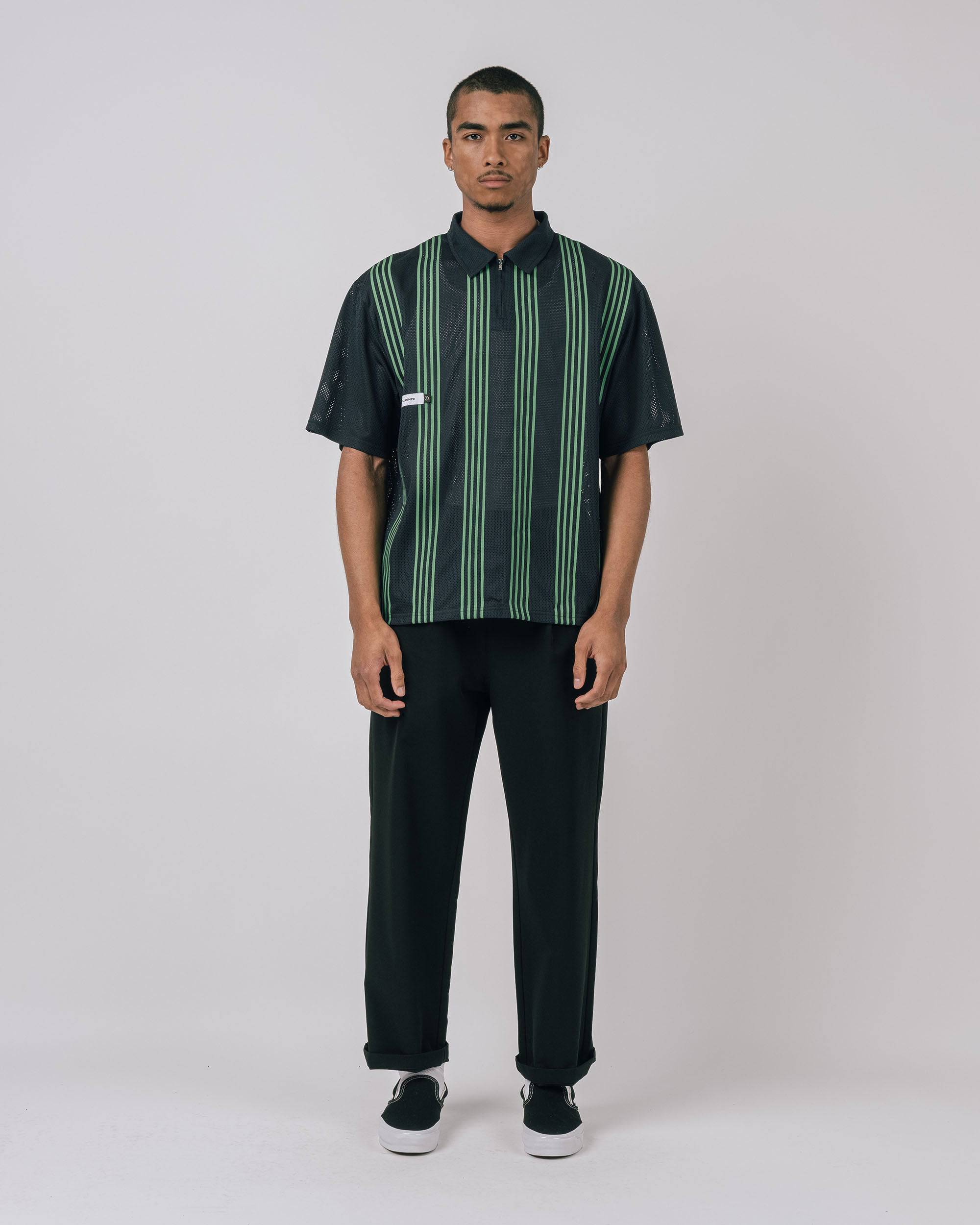 Howard Mesh Zip Polo back view showing perforated mesh fabric