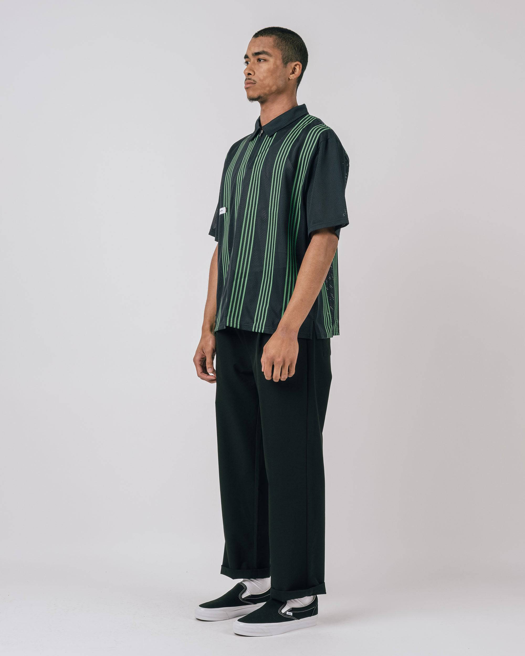 White contrast zipper detail on charcoal mesh polo