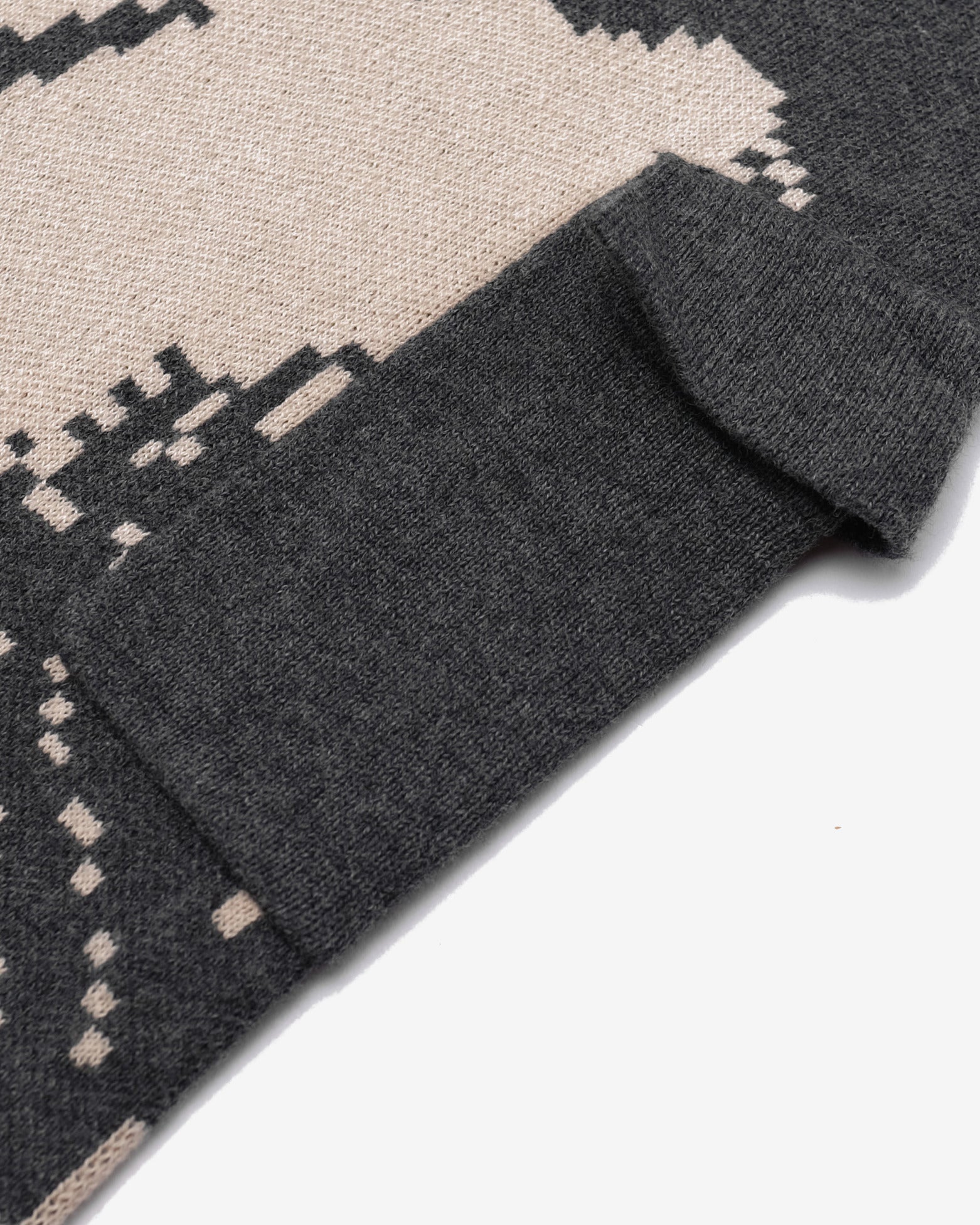 Gray patterned fabric with geometric design on a white background