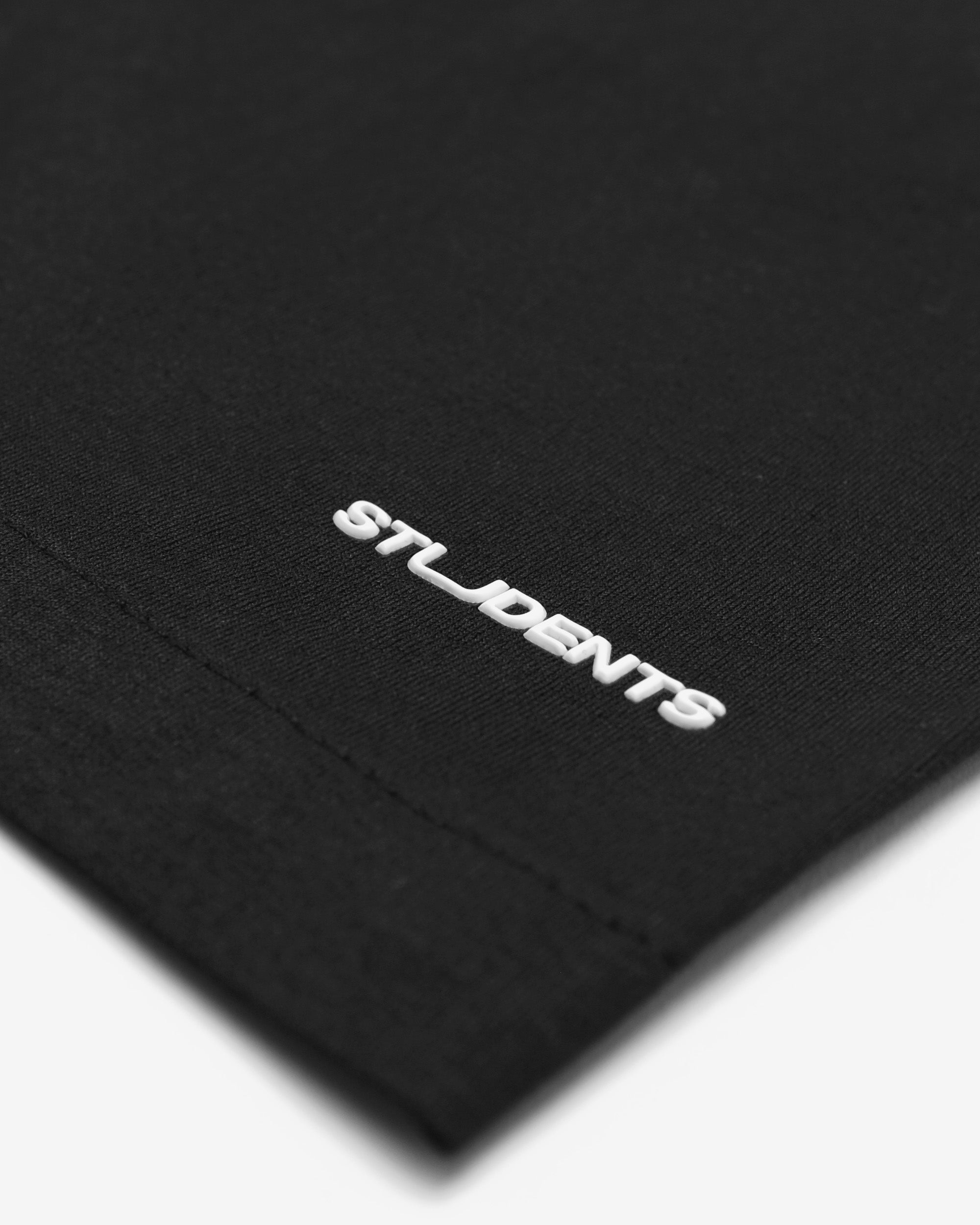 Black fabric with 'STUDENTS' embroidered in white on a white background
