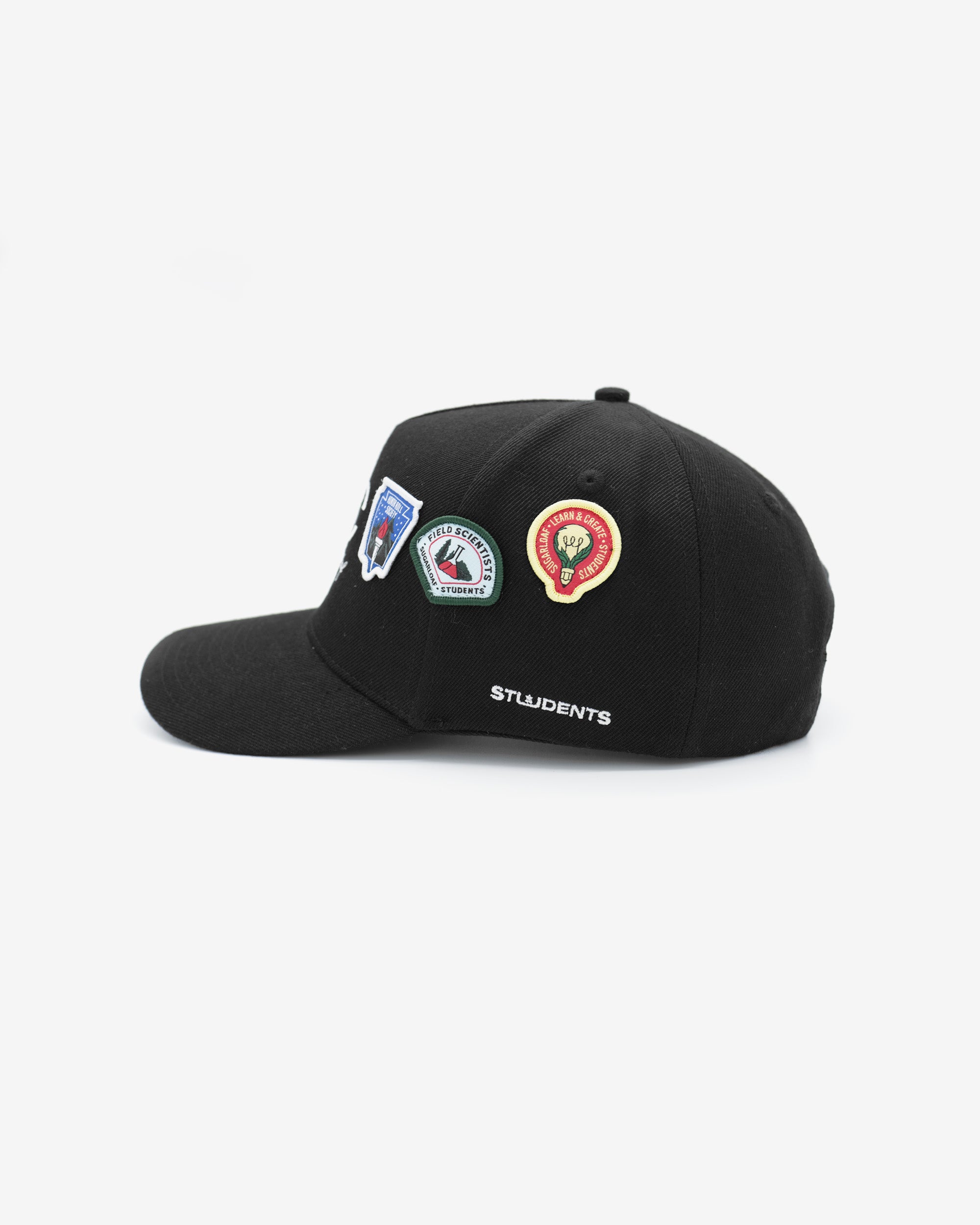 Black cap with patches on a white background
