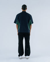 Load image into Gallery viewer, Assistant S/S Jersey Zip Polo Shirt
