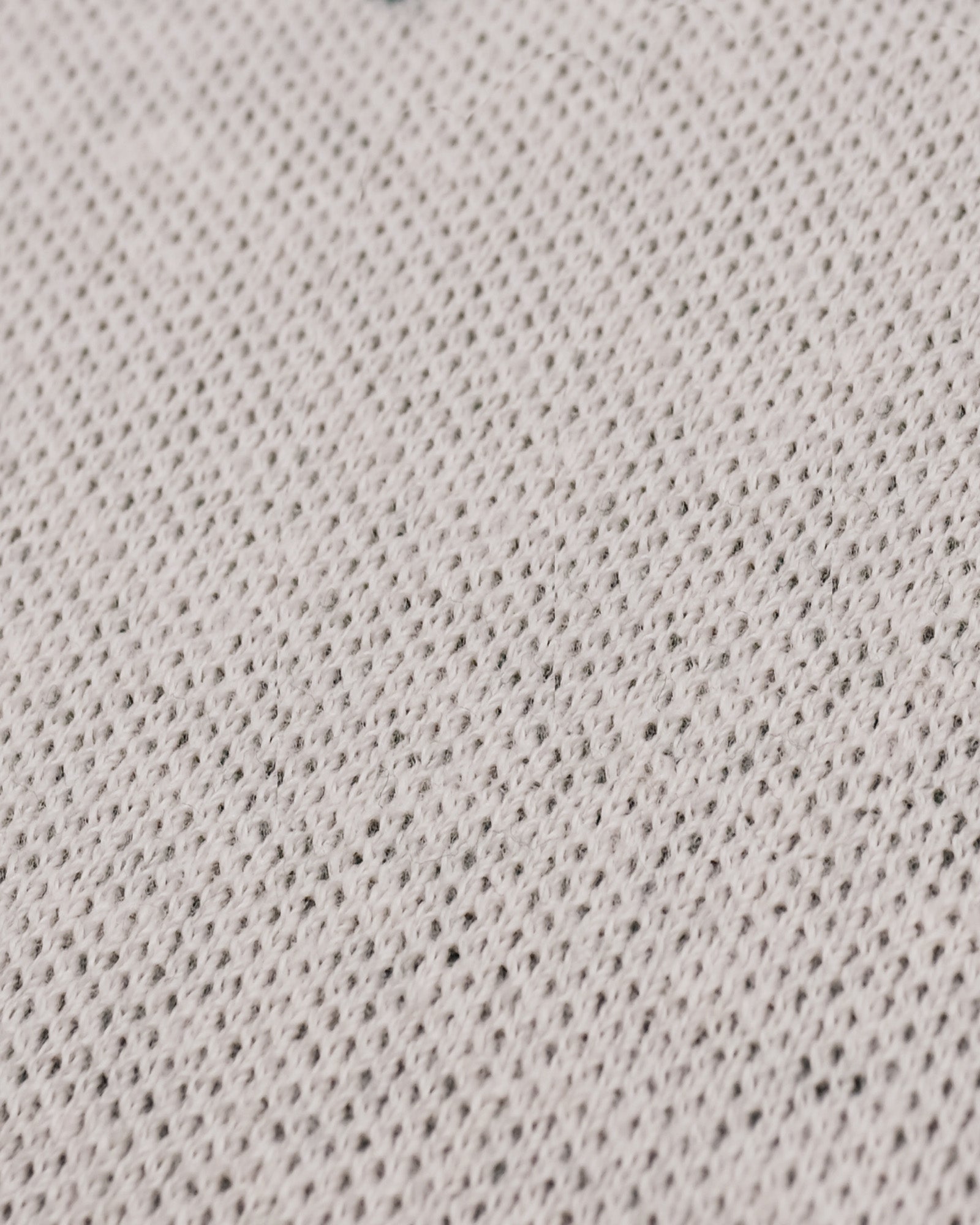 Close-up of a textured gray fabric surface