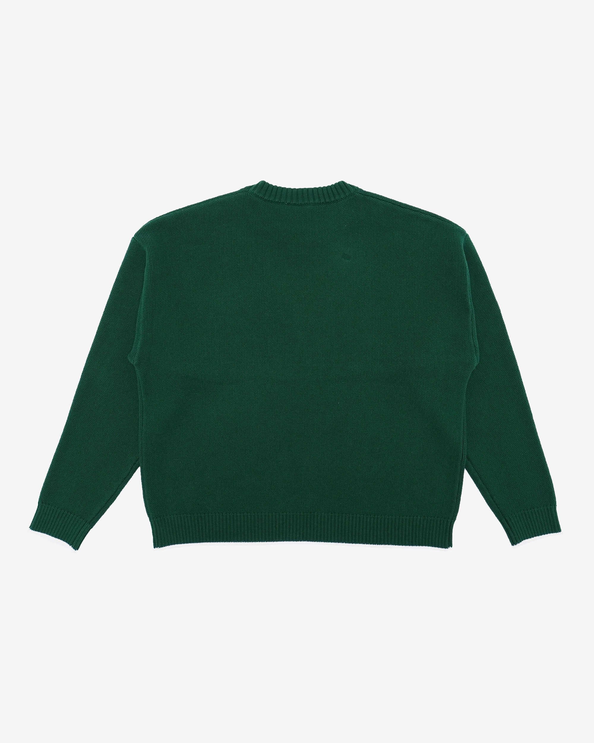 Green sweater on a white background