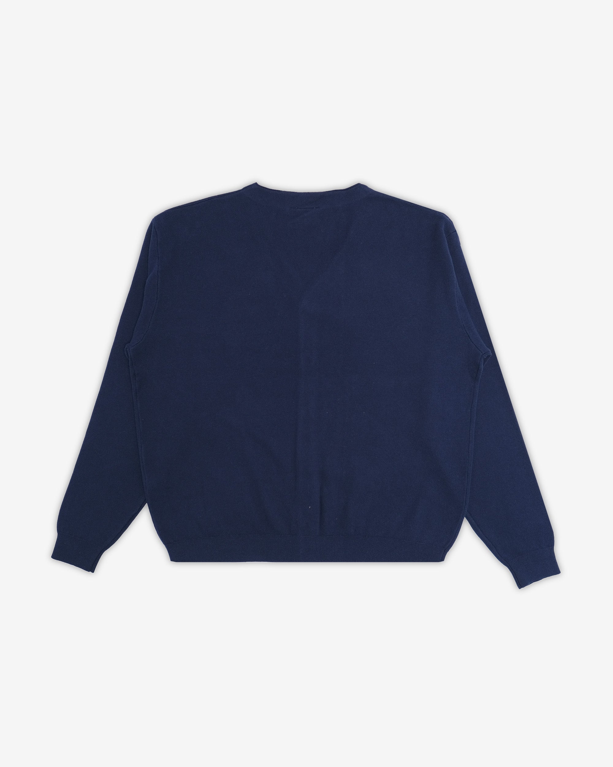 Navy blue sweater on a white background